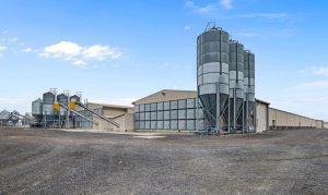 YMAKO poultry farm project — automated layer cage installation in commercial house