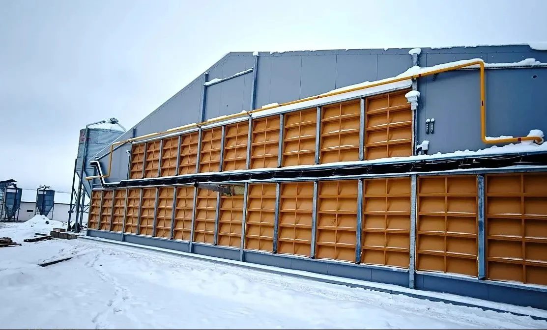 YMAKO poultry equipment project — automated cage systems for commercial farms